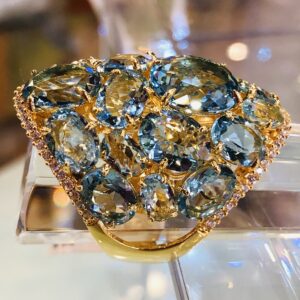 Giant Blue Topaz Dome Ring Featuring Over 30 Stones